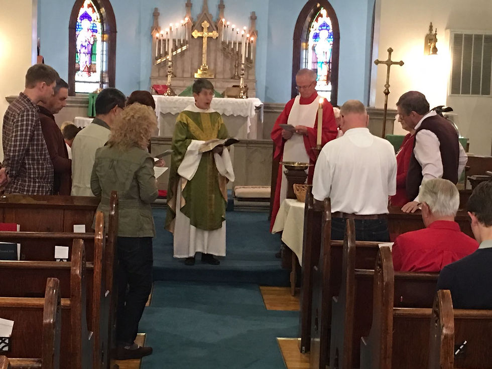 Mother Joan installing the 2017 Vestry members