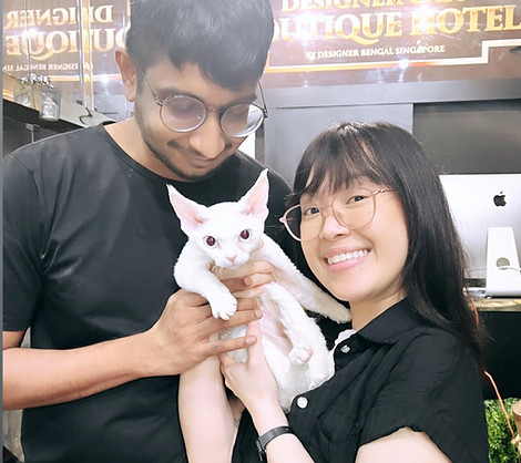 happy customer posing with their devon rex kitten bought from Designer Bengal Singapore - near Sunset Way