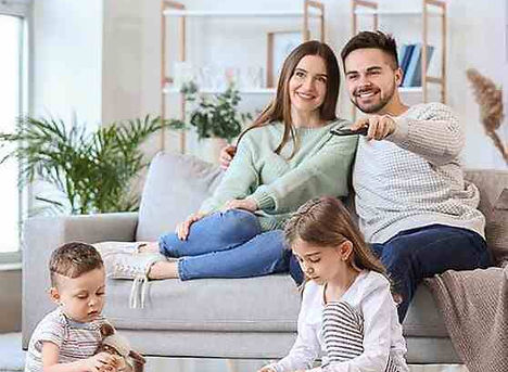 Family relaxing comfortably indoors after AirBOSS Heating & Air completed HVAC installation in Central Arkansas.