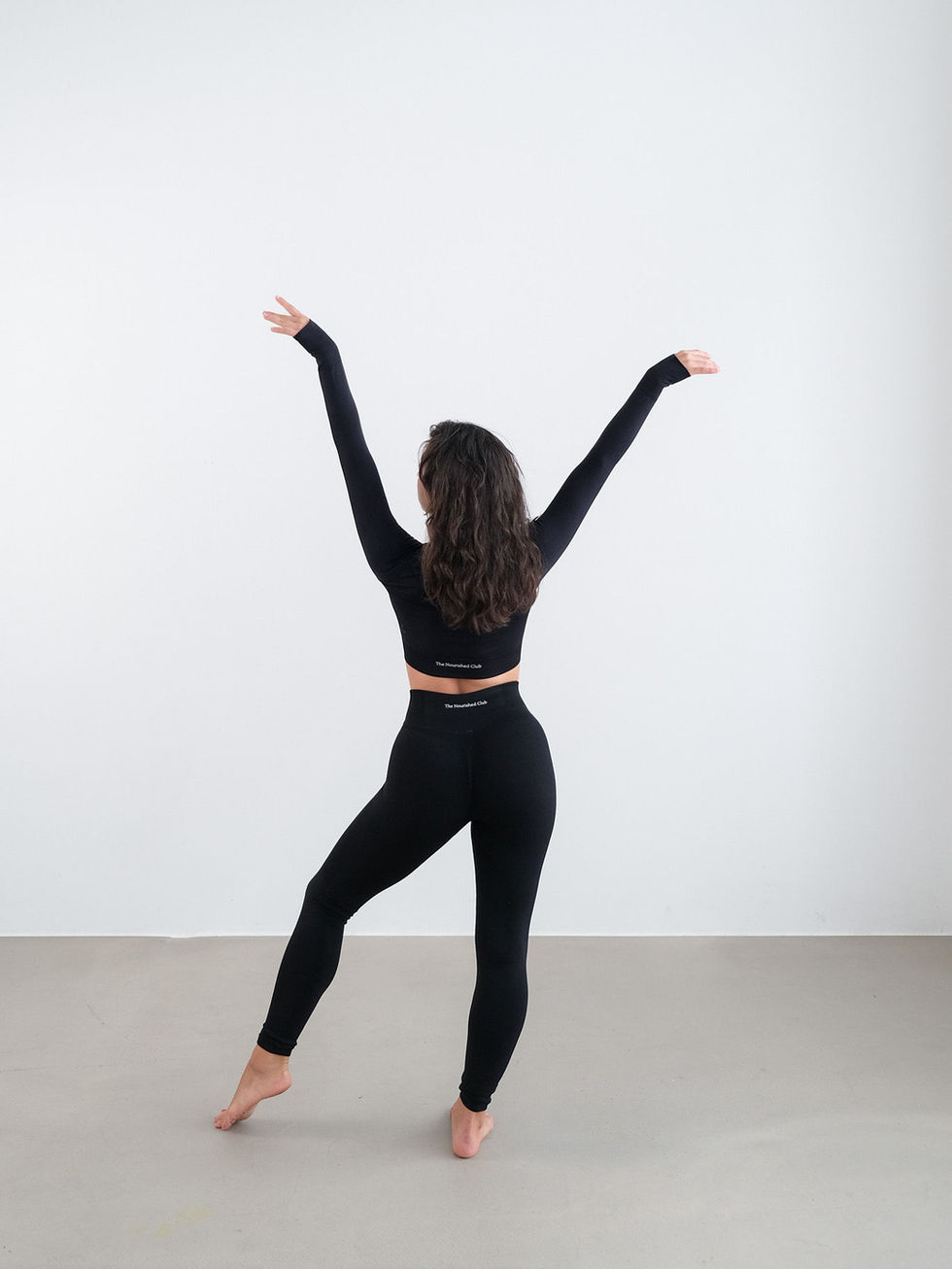 high waist sculpting leggings by The Nourished Club, back view