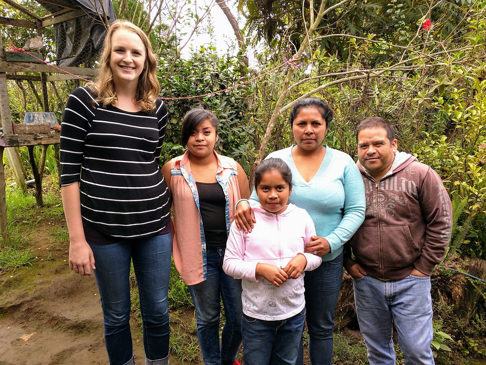 The family I help support through Common Hope. My sponsor child, Dayana, is next to me.