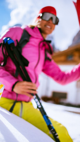 Skier with a can of XS Energy Drink