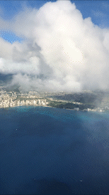 Shooting outside the window from his seat on the flight Bhushan Thakkar captures footage of Oahu