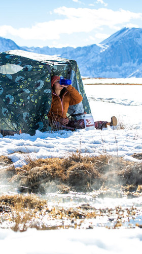 Woman snow camping with XS Protein Powder