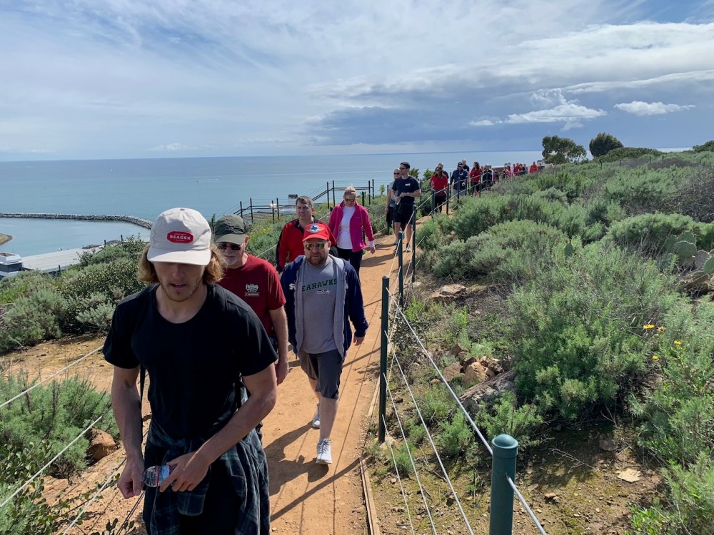 a group of people hiking a trail