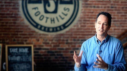 Marketing Head at Foothills Brewery getting interviewed.