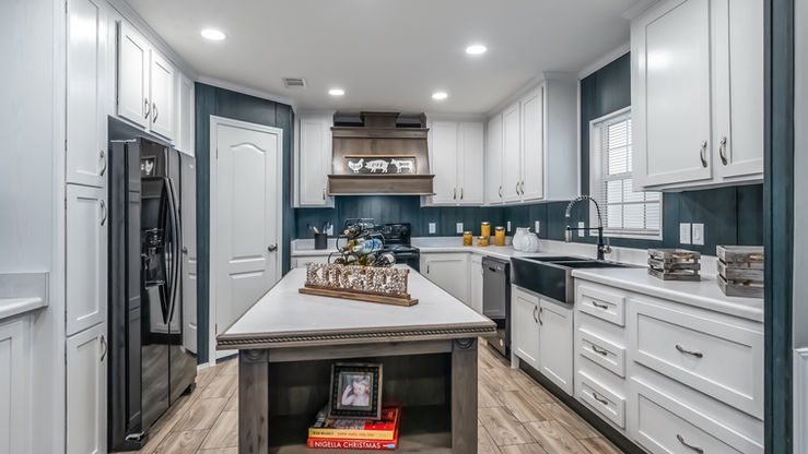 Large kitchen in MD-50 with center island, open storage, and wood-look flooring