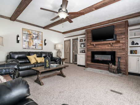 Spacious living room with open floor plan in an affordable manufactured home