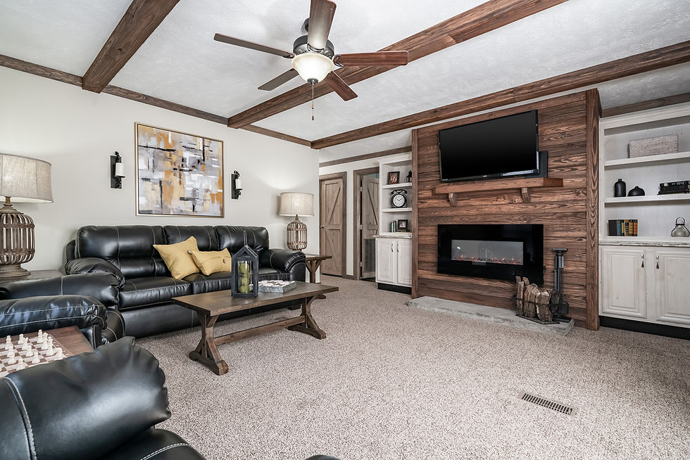 Spacious living room with open floor plan in an affordable manufactured home