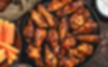 grilled-spicy-chicken-wings-served-with-tomato-and-2025-03-24-23-18-16-utc.jpg