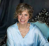 kristin hadley in blue chair.png