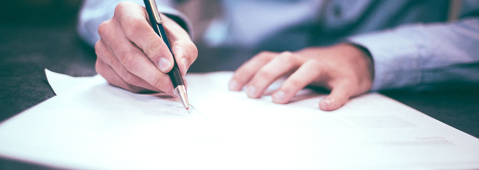 Man Writing Document
