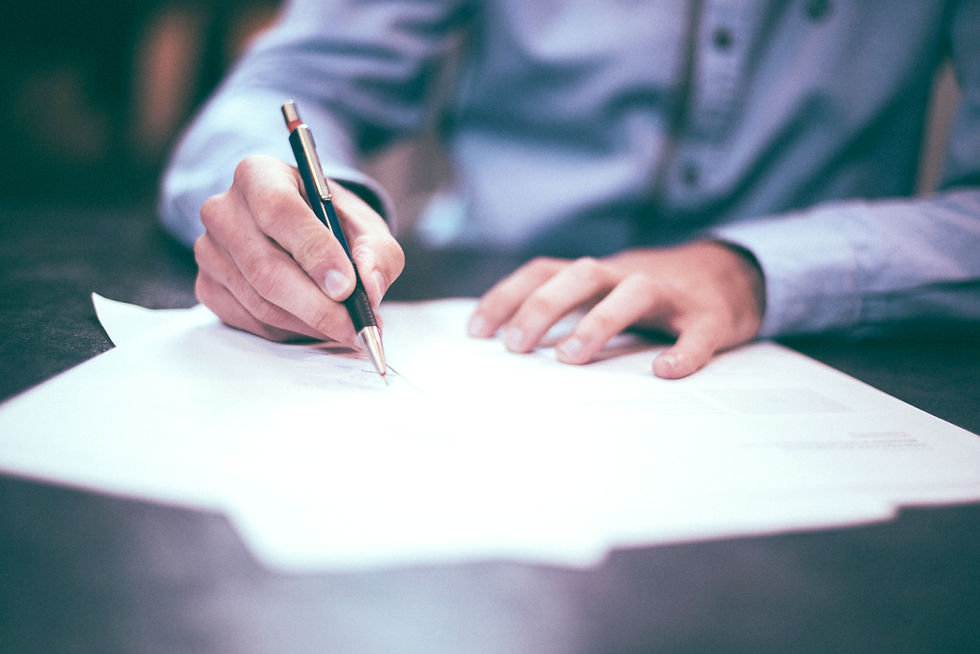 Man Writing Document