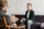https://www.pexels.com/photo/man-in-black-suit-jacket-sitting-on-brown-wooden-armchair-4100661/