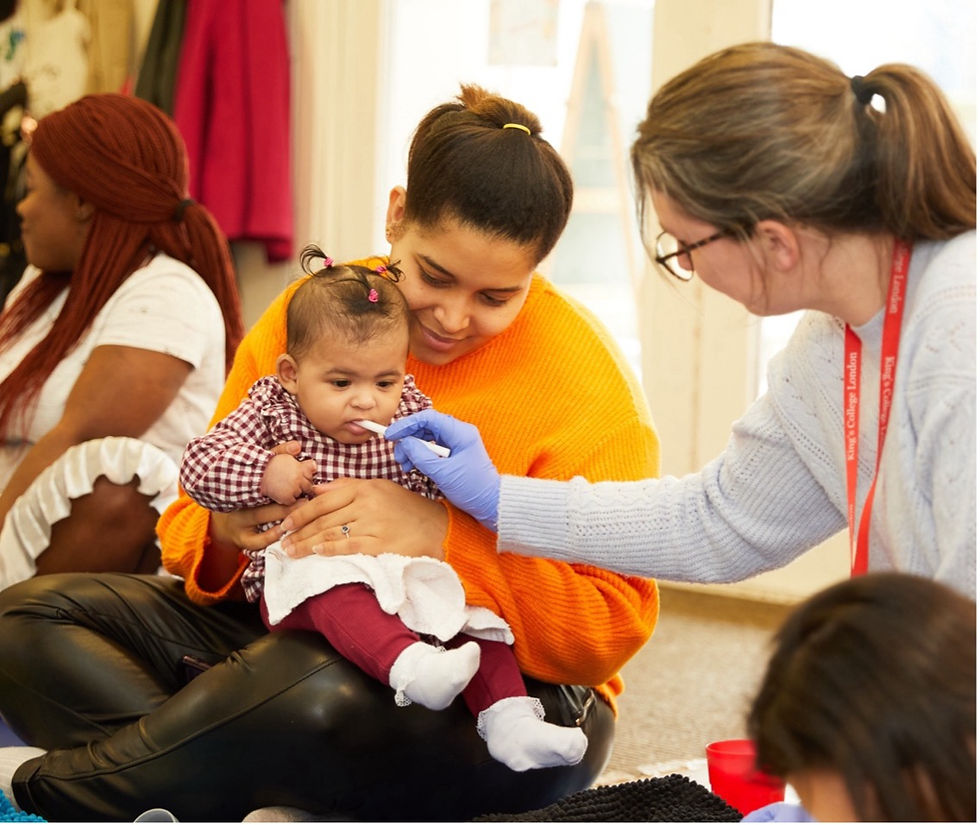 Saliva being taken from a baby during a Melodies for Mums session. Photo credit: Breathe Arts Health Research