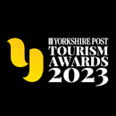 Black square logo with a yellow graphic 'y' to the left and white text: 'yorkshire post tourism awards 2023' to the right.