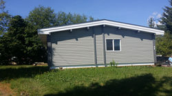 New siding, roof and trim