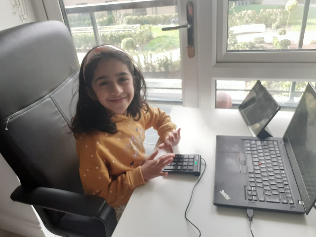 A SPARK learner enjoying a live online class