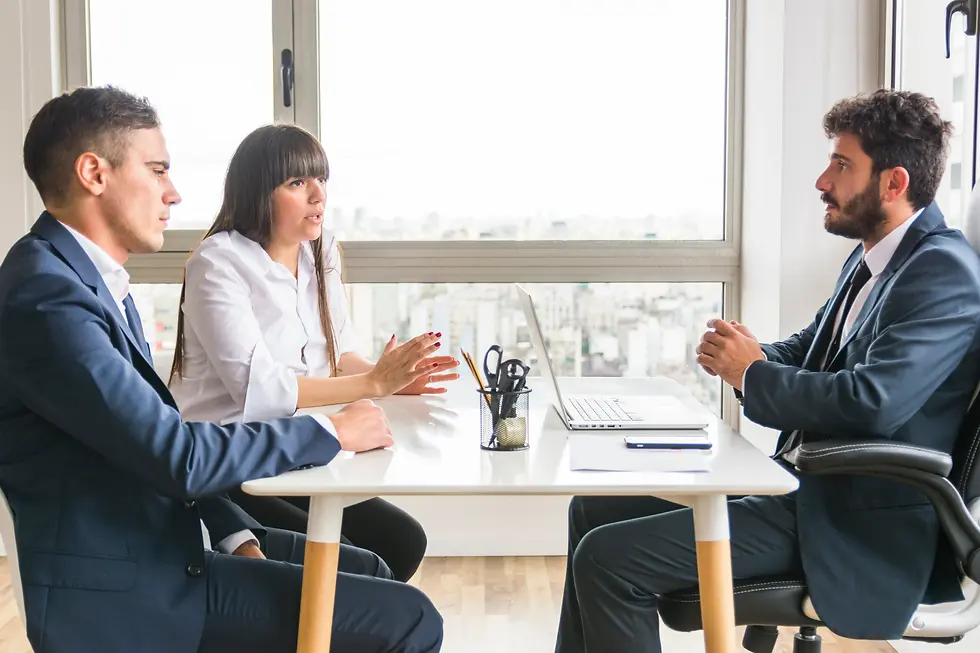three business professionals having discussion office