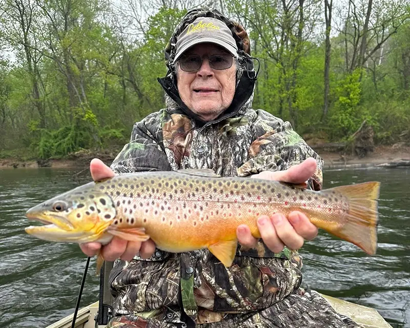 women hold trout caught in Branson during a guided fishing trip on Taneycomo with CastAway Charters