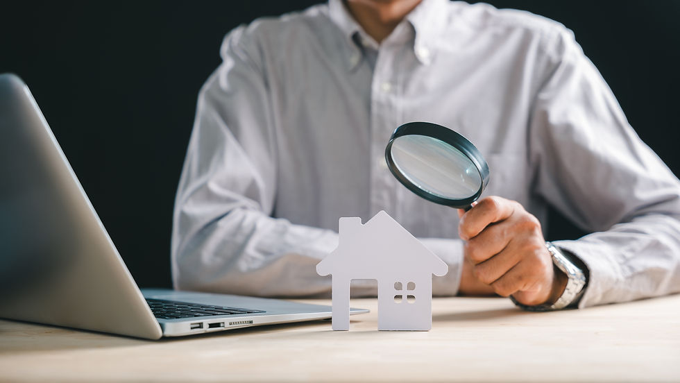 Real estate appraisal, inspector with magnifying glass on house model, searching property
