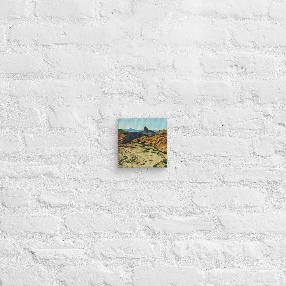 Thumbnail: Desert landscape artwork with rugged hills and distant mountains.