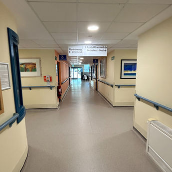 Photograph of a hospital corridor junction  