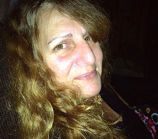 Melanie L. “Mel” Courson