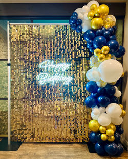 Gold Shimmer Wall with Happy Birthday Neon Sign
