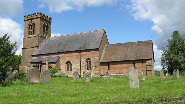 Exterior of St Bartholomew’s Church in Grimley, medieval stone church with churchyard in rural Worcestershire.