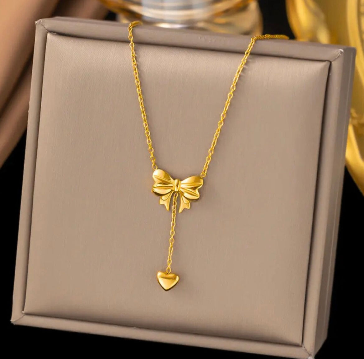 Cute Gold Bow Pendant Necklace with Dangling Heart – Minimalist Jewelry