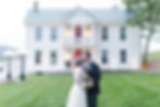 Bride and groom kissing at the Manor at Breckenridge wedding venue in Virginia