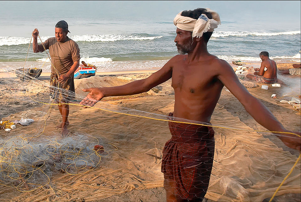 Fisherman with nets in Kerala, India