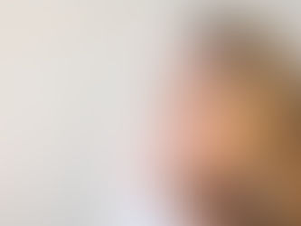 a blonde woman looking far away