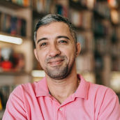 a mid age man smiling