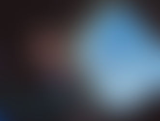 a young man sleeping with a travel pillow during a flight