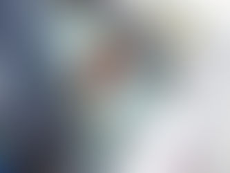 a woman holding her phone in a taxi