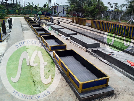 11 moulds filling slurry.jpg