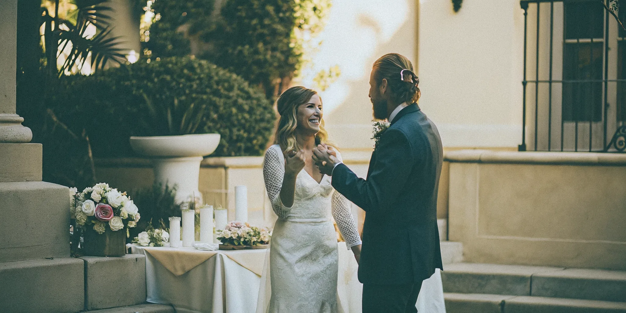 Elegant wedding tablescape with seasonal flowers and candlelight at a San Diego outdoor venue