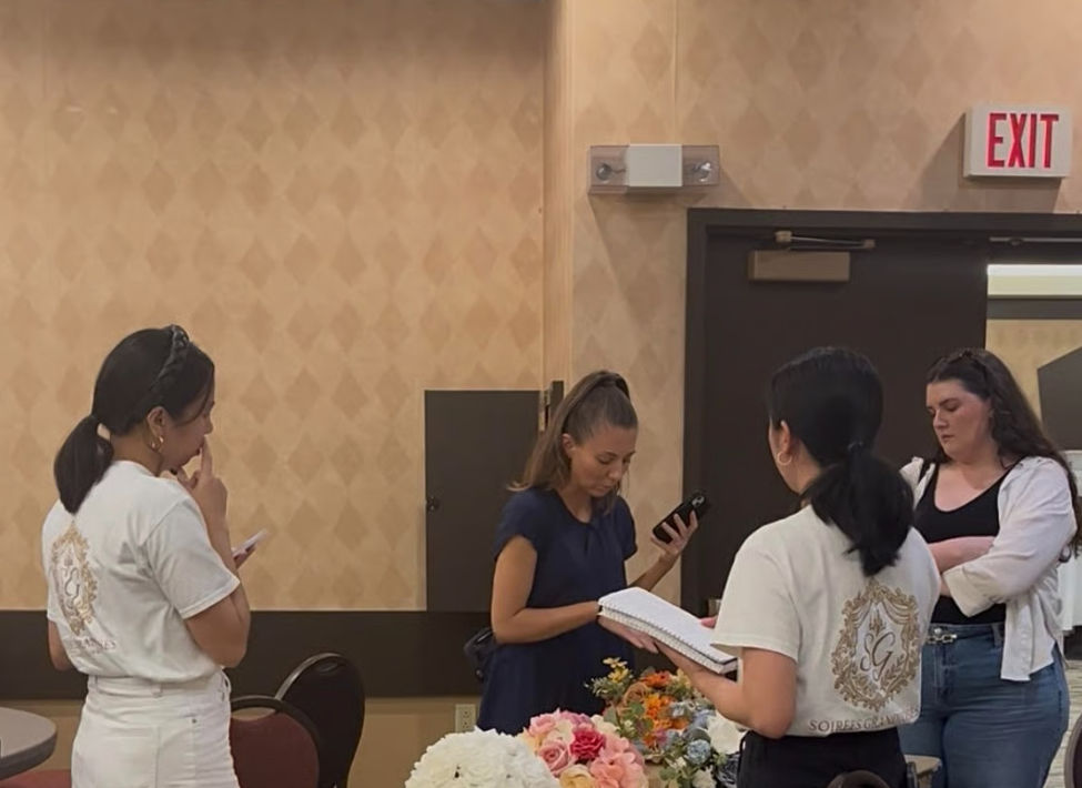 Team SG meets with the Bride-to-be and one of her bridesmaids to discuss ideas and explore feasible, attainable concepts during a collaborative brainstorming session.