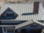 Gray standing seam metal roofing on a house in Tucson AZ