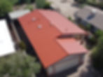 New red metal roofing on a house in Tucson AZ