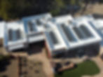 New construction roofing on a modern building with solar panels
