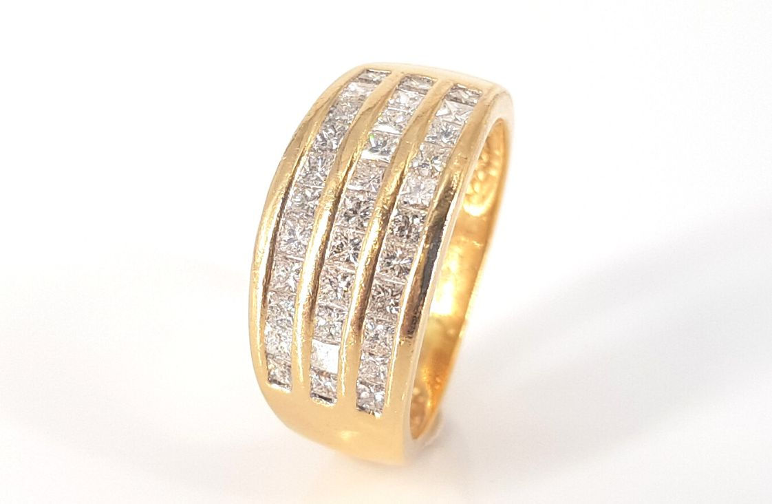 18CT YELLOW GOLD CHANNEL SET DIAMOND RING