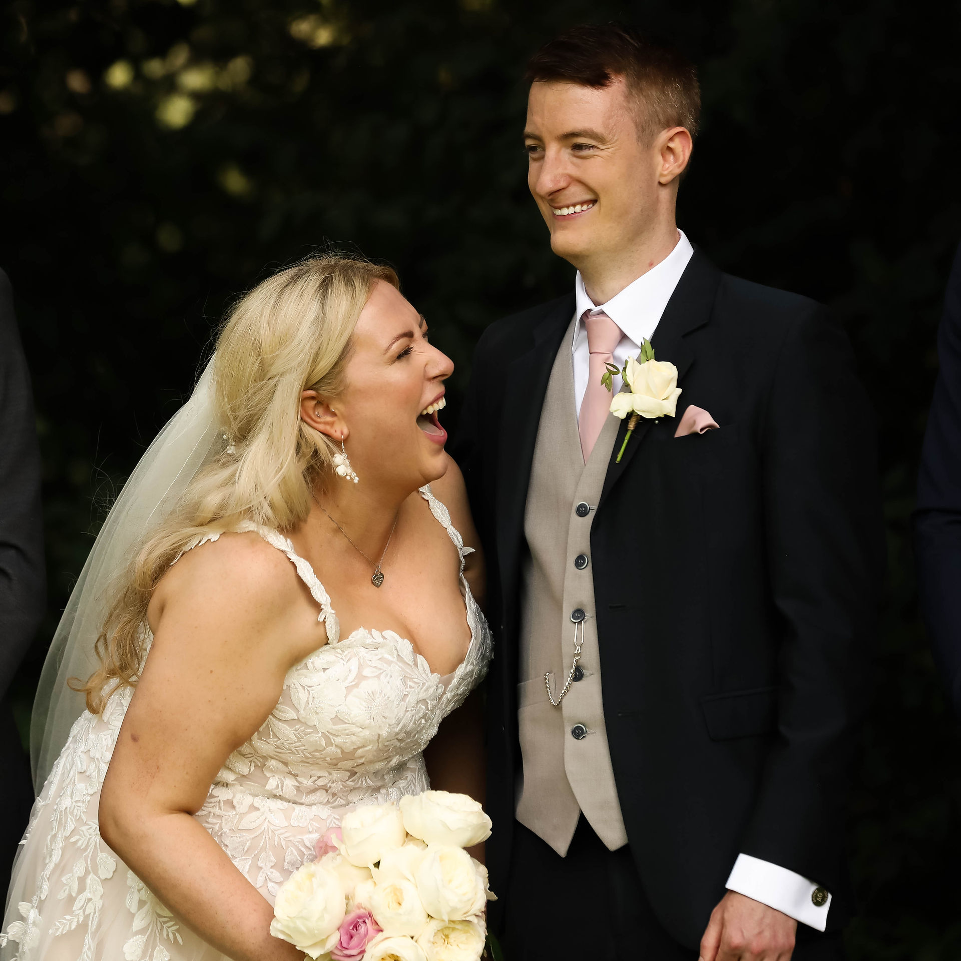 bride and groom laughing during their couple shots