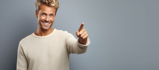 happy-adult-male-pointing-smiling-indicating-object-open-area.jpg