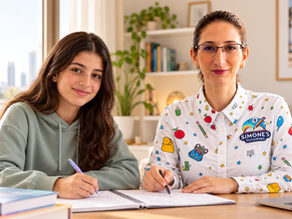Simone discussing inclusive learning goals with a teenage student during a tutoring session.