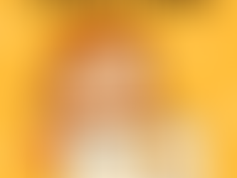 Cartoon illustration of a smiling young girl holding an alphabet tracing worksheet featuring the letter "B" and a bear image. The background is bright yellow with soft clouds, and bold text at the top reads "Ready-to-Print Alphabet Tracing Worksheets for Early Learners."