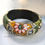 Thumbnail: Sun/Moon Mandala Bangle in jade/amber