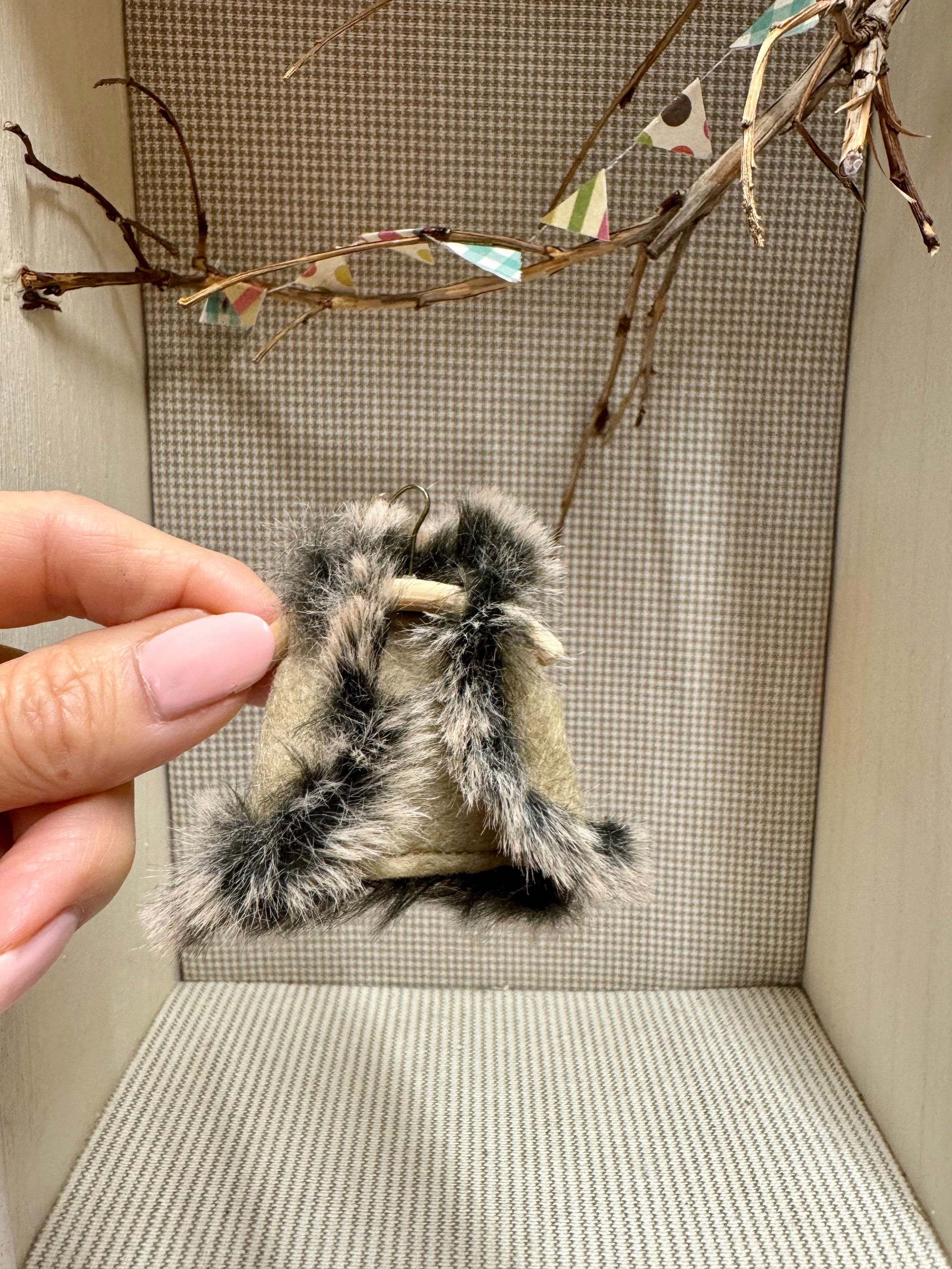 Faux fur trimmed mouse gilet. 